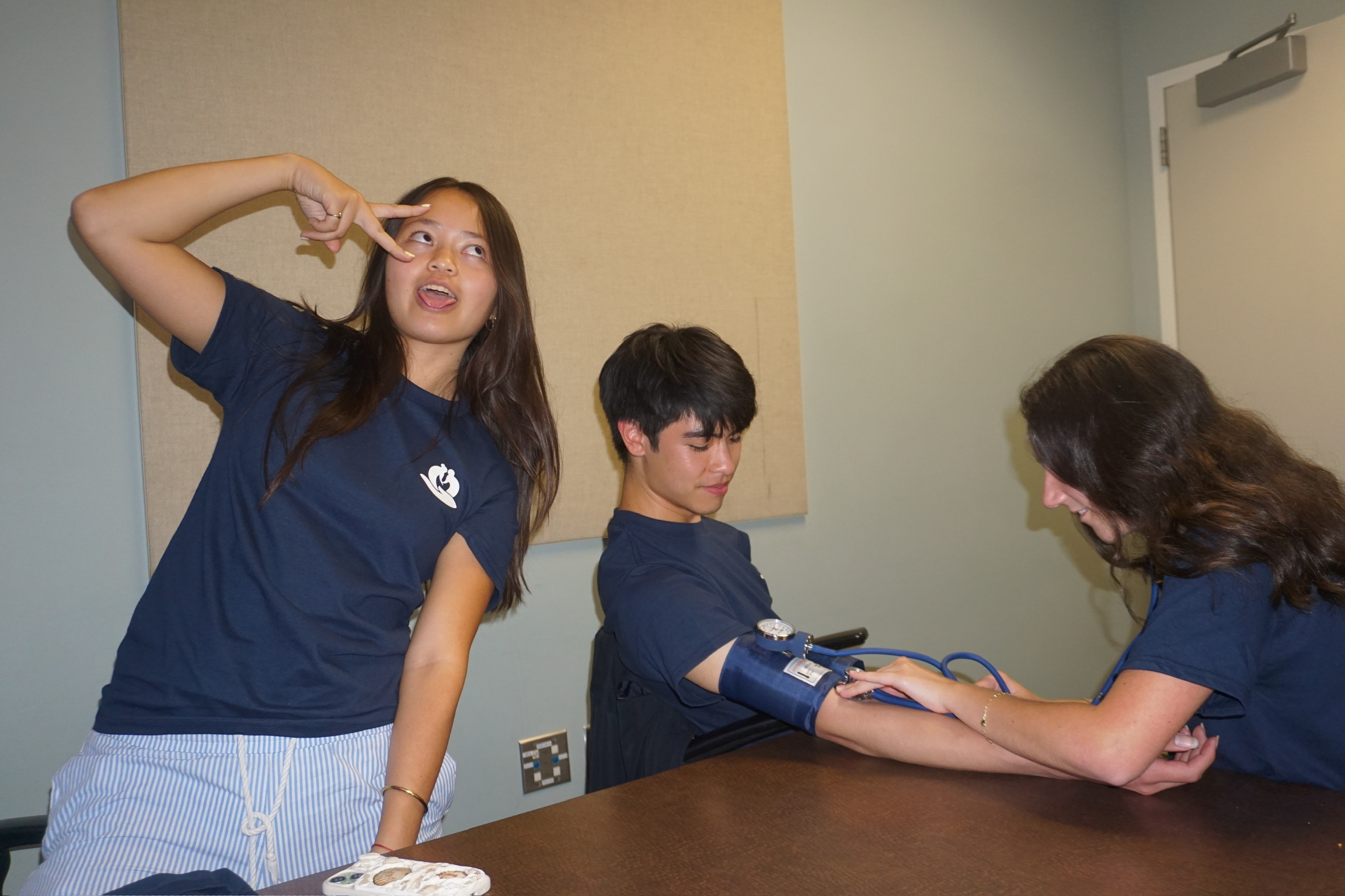 CONNECT students practicing a wellness check